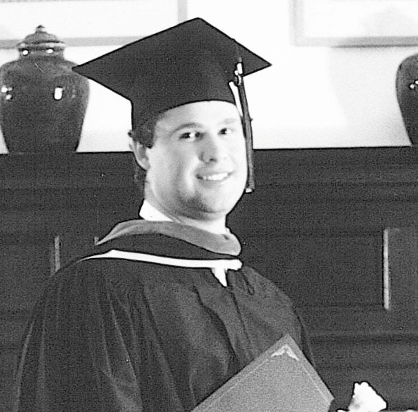 Eric Jacoby graduating with master of architecture degree