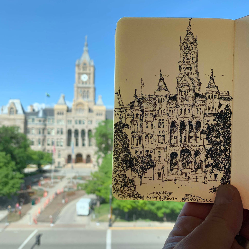An image showing the Salt Lake City and County Building in the background and a travel sketch by Eric Jacoby of the same composition