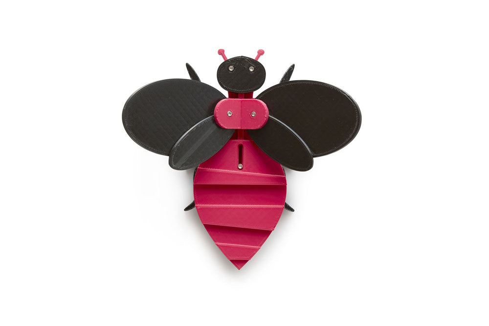 magenta and black toy bee